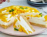 Saftige Mango-Torte mit cremigem Frischkäse und Keksboden. Perfekt für schnelle torten, die begeistern!